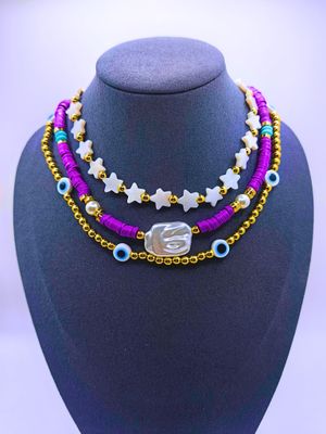 Collar Plástico Triple Calenbi Bohemio Purpura Estrellas y Ojo Turco