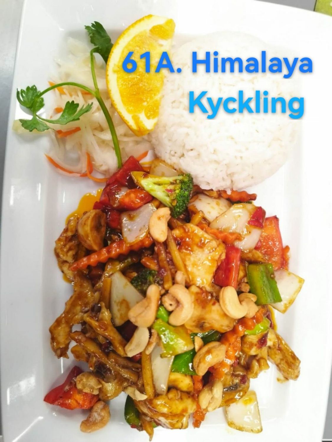 61. Himalaya wok med cashewnötter och..  (välj mellan Kyckling, Biff, Tigerräkor, Tofu eller Vegetarisk). 🌶