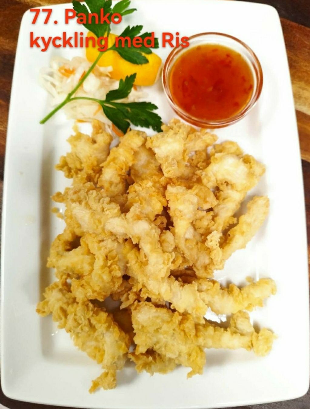 77. Pankopanerad kyckling med sötsursås