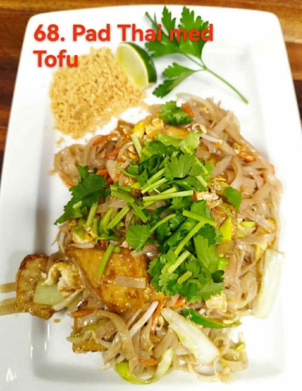 68. Pad Thai risnudlar med grönsaker och..  (välj mellan Kyckling, Biff, Tigerräkor, Tofu eller Vegetarisk)