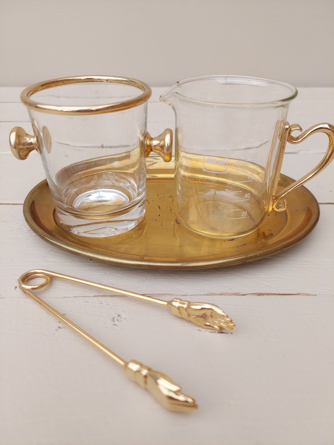 Roomstel in glas en goud met handjesgrijper