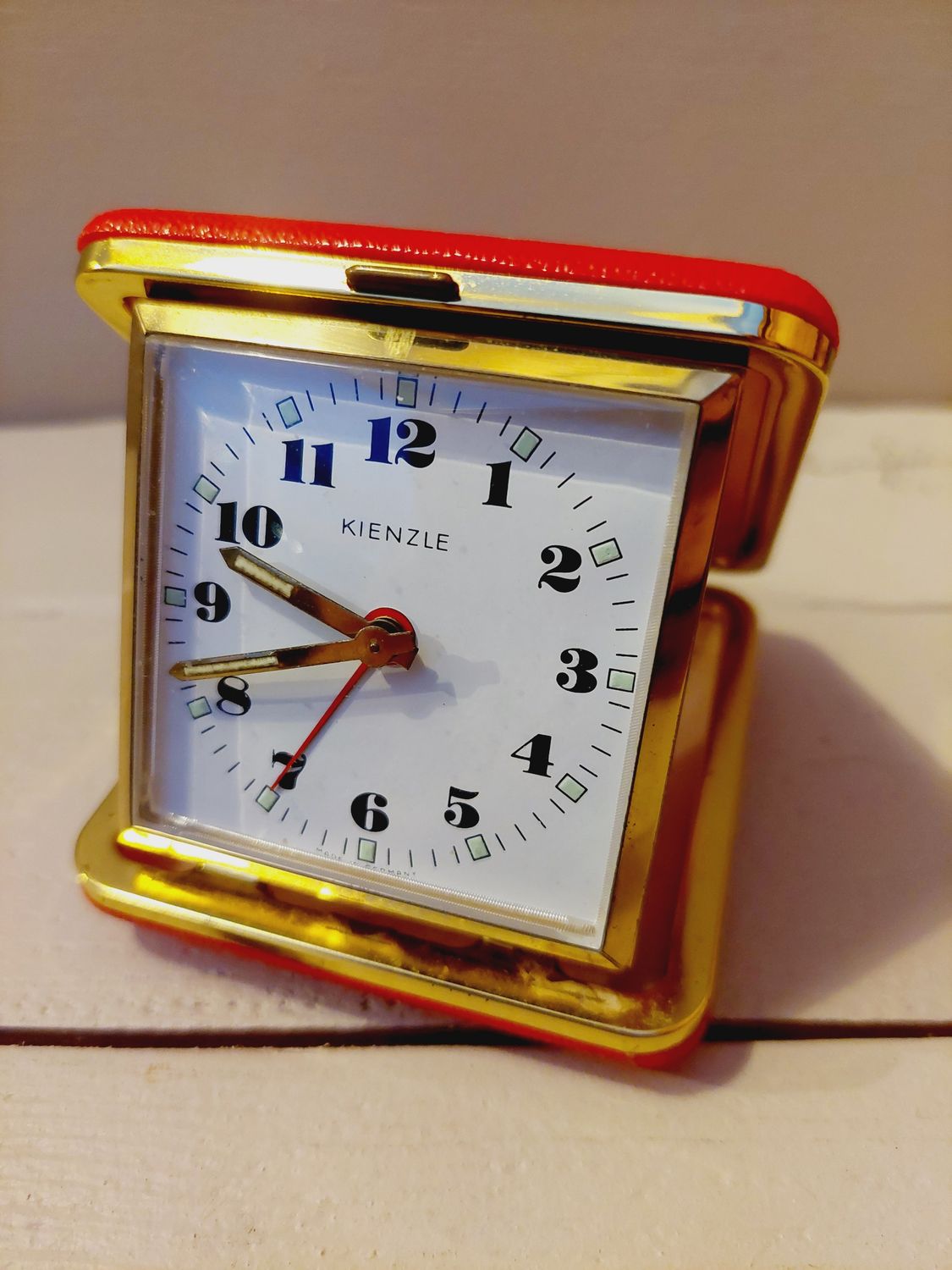 Vintage Kienzle reiswekker – rood opklaphoesje