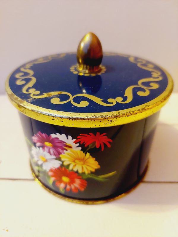Vintage Côte d’Or blik – donkerblauw met bloemen en gouden rand