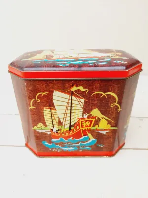 Vintage theeblik met zeilschip en Oosterse illustraties