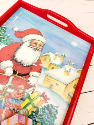 Vintage dienblad in rood hout met tekening van kerstman achter slee