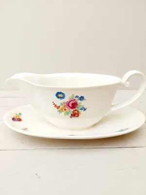 Vintage sauskom - sauspot Petrus Regout Boudewijn - crème porselein met bont bloemendecor