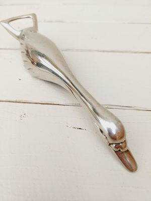 Vintage verzilverde flesopener in de vorm van een gans of eend