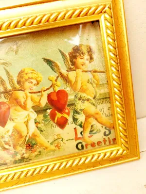 Vintage goudkleurige lijst met romantische engelen afbeelding