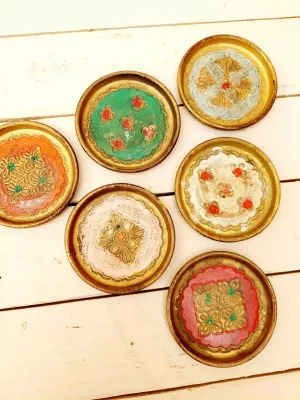 Zes vintage florentijnse onderzetters met goudaccenten