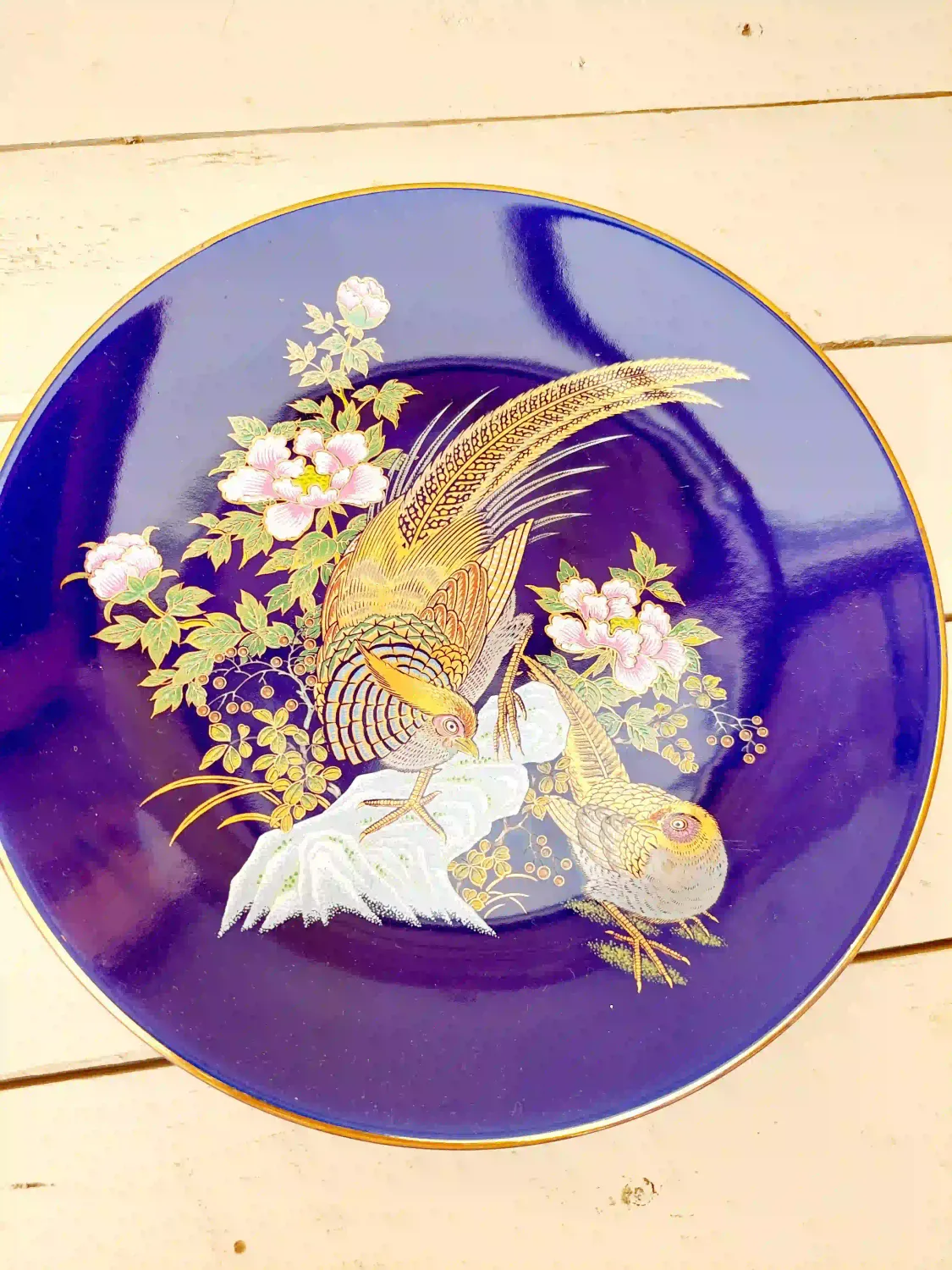 Vintage kobaltblauw sierbord met vogel en goudrand, 21,5 cm