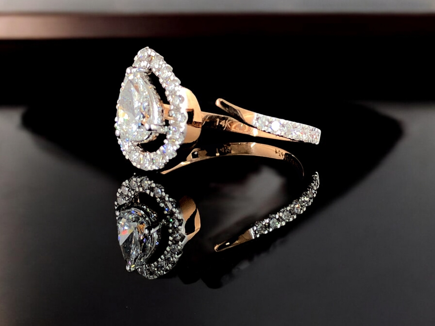Lustrous Teardrop – Pear Pavé Halo Ring