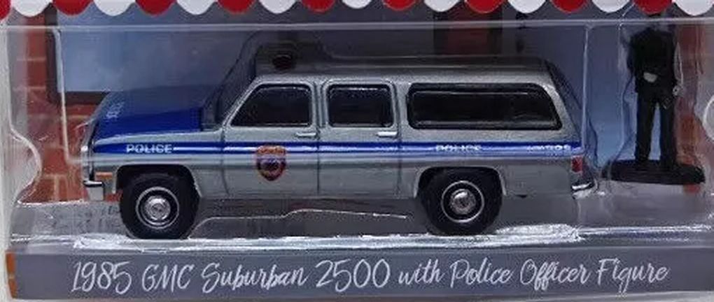 1/64 RAW CHASE - New York City Transit Police 1985 GMC Suburban 2500 Green Machine with Police Officer Figure