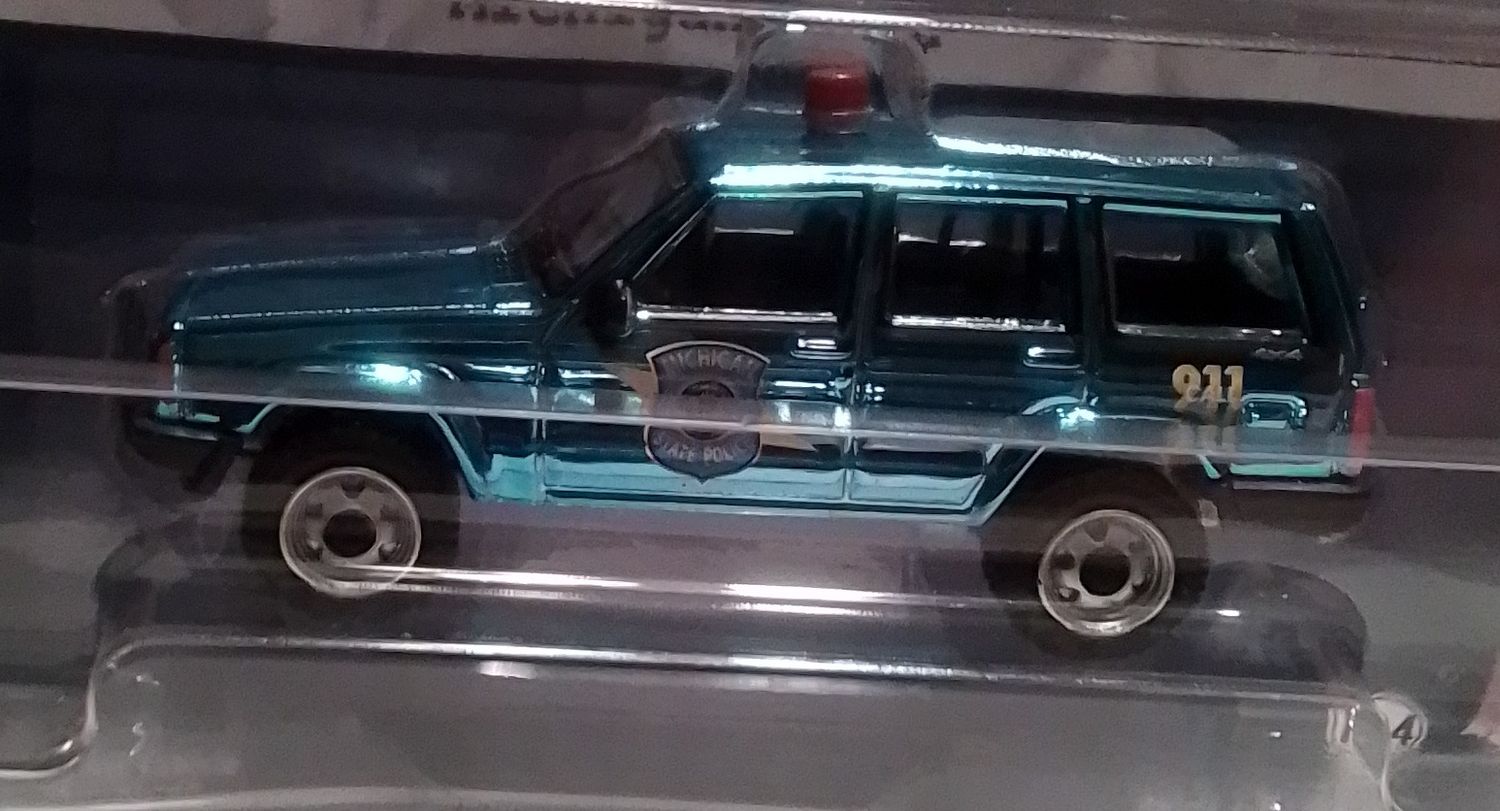 1/64 BLUE CHROME SUPER CHASE - Michigan State Police 2001 Jeep Cherokee