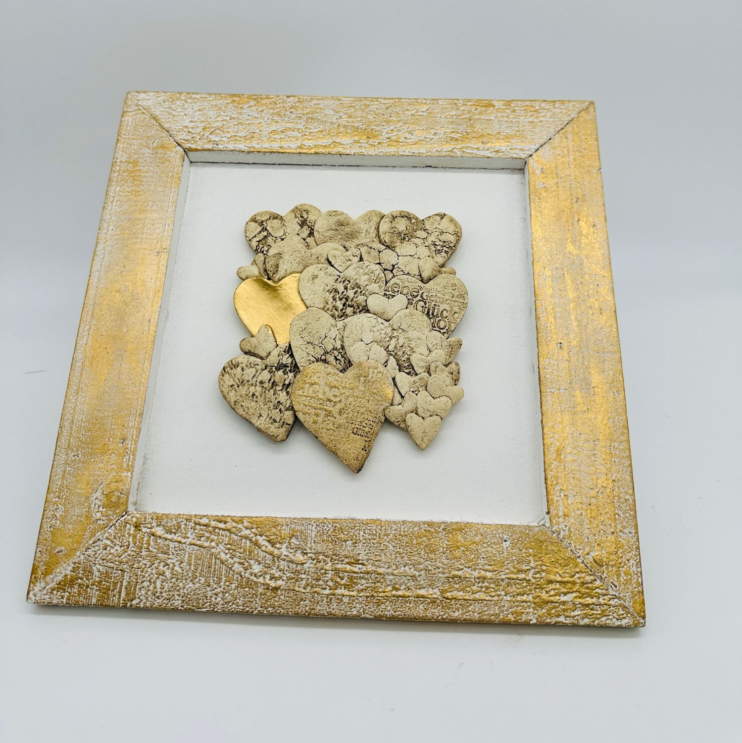 Tonherzen im Holzrahmen 20x20 cm