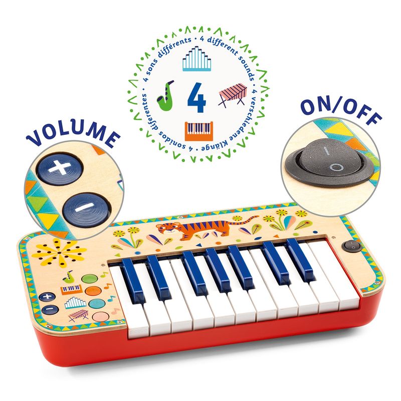 “Close-up van de toetsen van het Djeco Animambo keyboard. Aan en uit knop, volume knopjes en muziekkeuze"