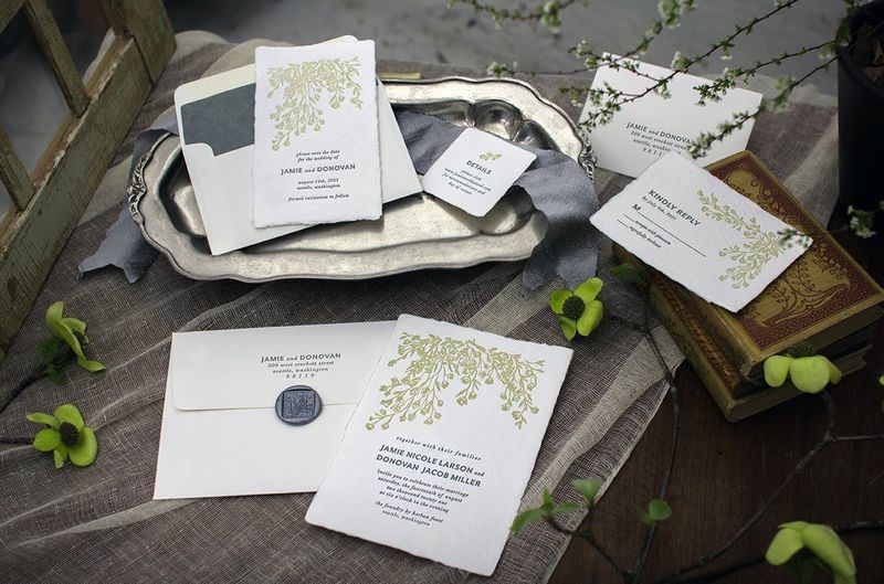 Samples of wedding invitations, save the dates, handmade papers, and letterpress
