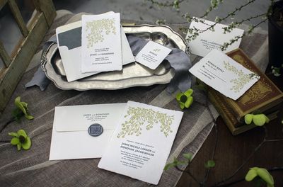 Samples of wedding invitations, save the dates, handmade papers, and letterpress