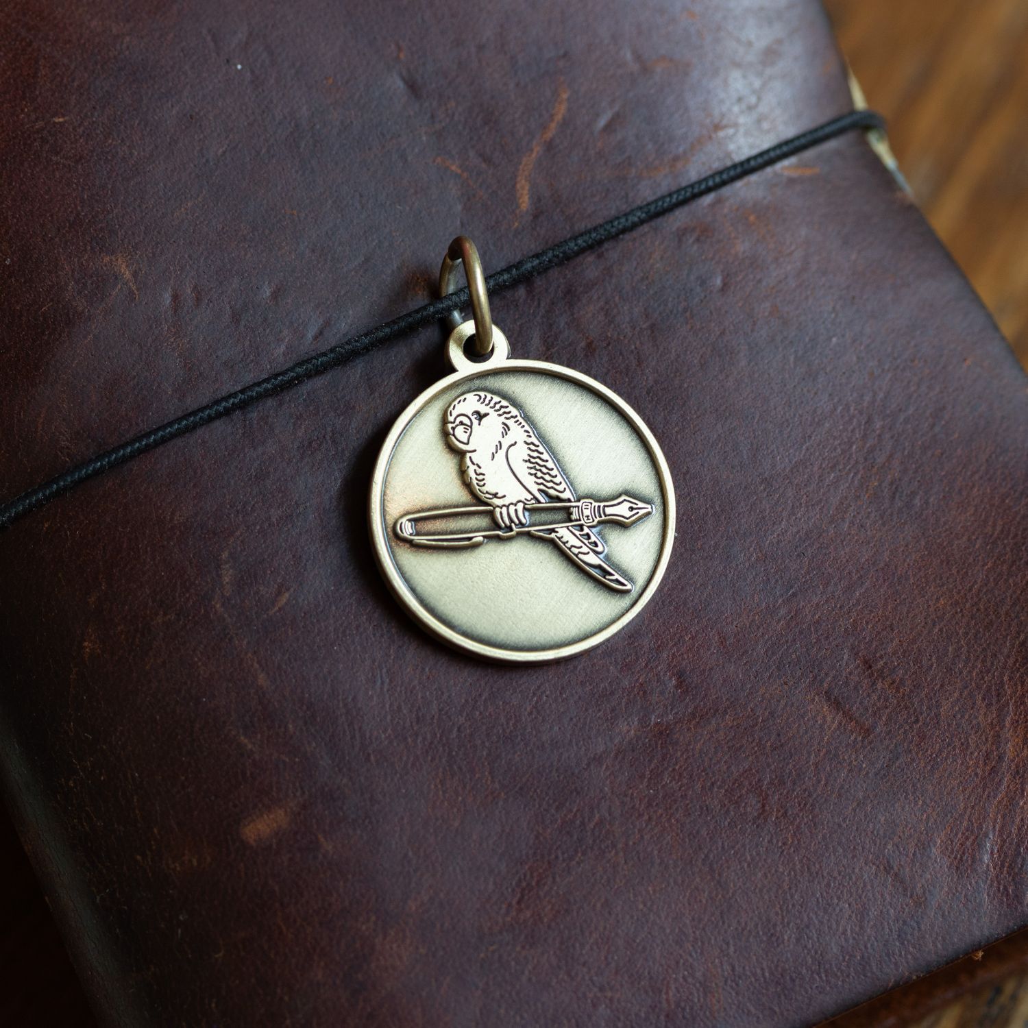 Oblation Bird &amp; Pen Charm