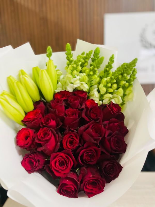 20 Red Roses with snaps and lilies
