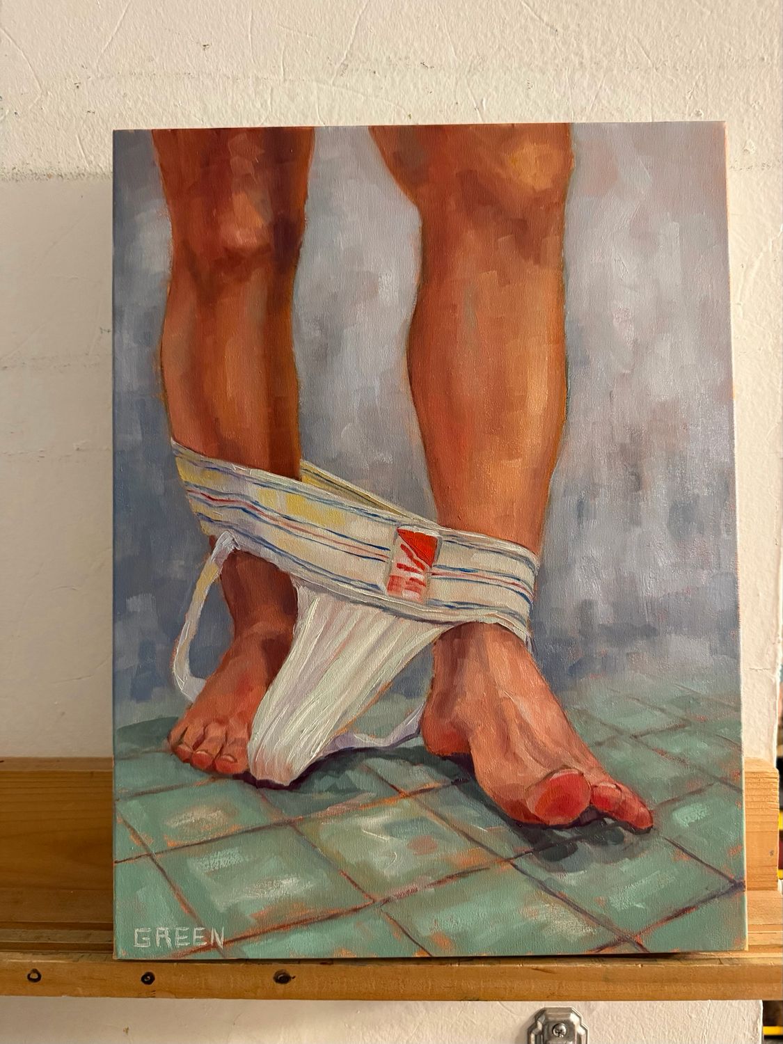 “By a Toe”