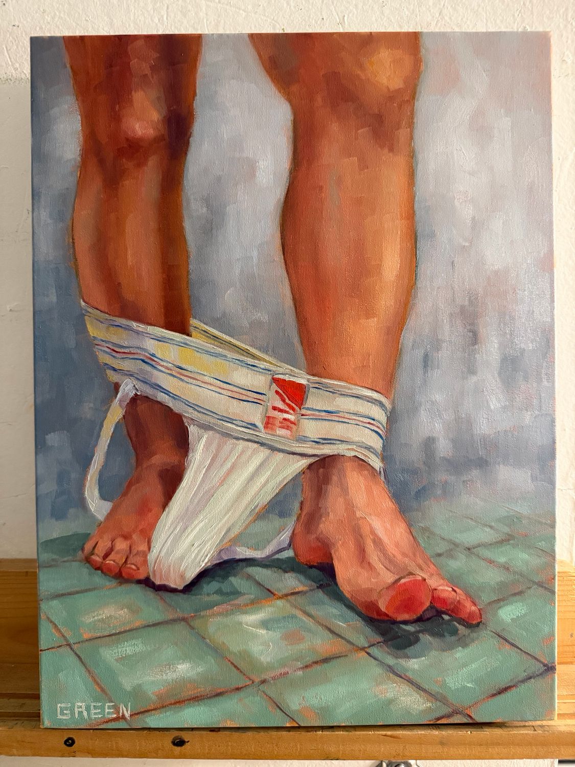 “By a Toe”