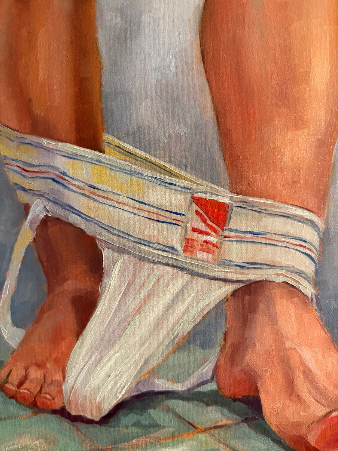 “By a Toe”