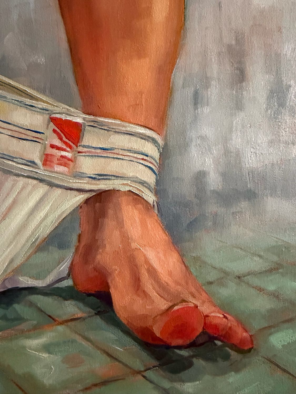 “By a Toe”