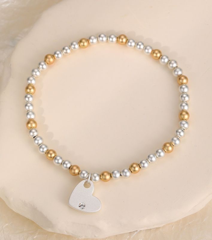 Gold And Silver Heart Bracelet
