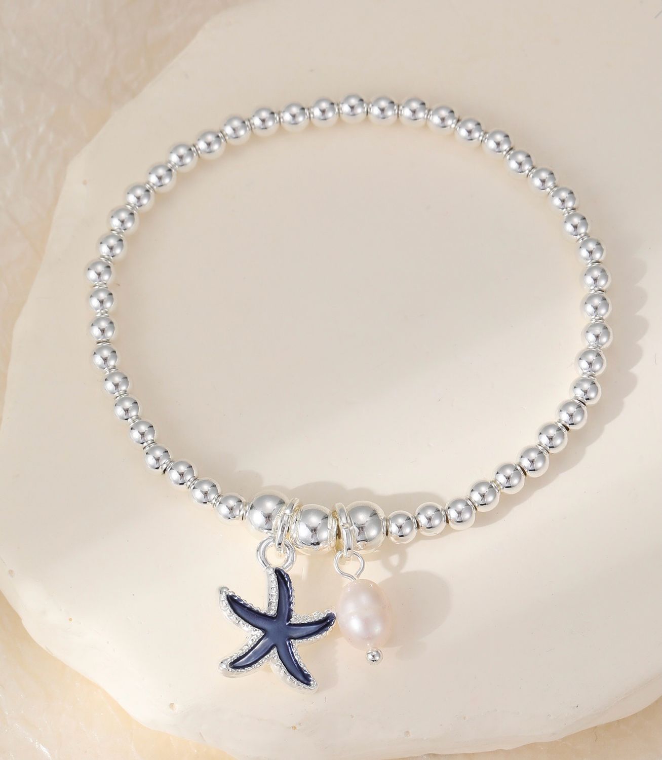 Blue Tone Starfish Charm Bracelet