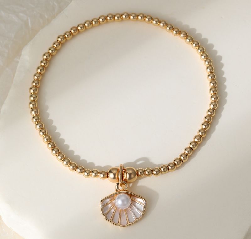 Gold Shell Charm Bracelet Gold Shell Charm Bracelet