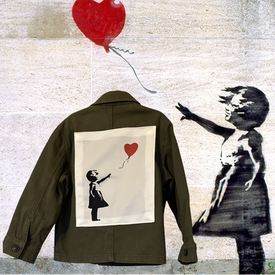 Veste bébé Banksy : poésie et innocence