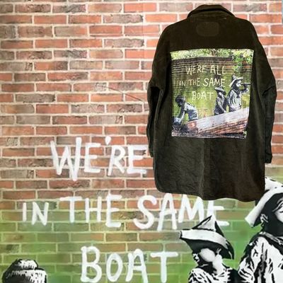 Veste velours Banksy – "We're All in the Same Boat"