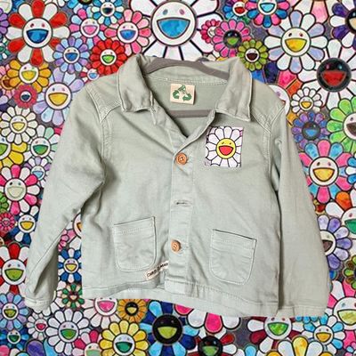 Veste bébé Haring : Éveillez la créativité dès le plus jeune âge !