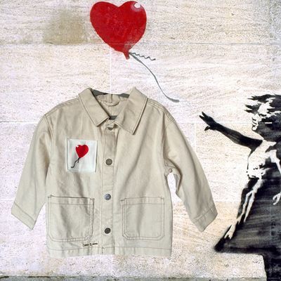 Veste bébé Banksy : poésie et innocence