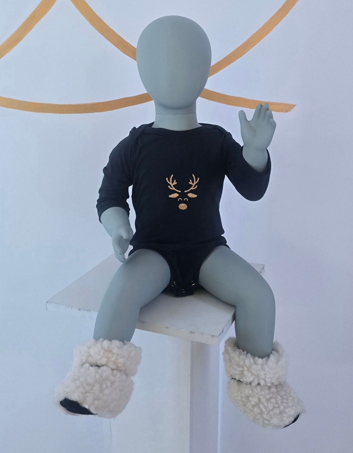 Baby Body mit Lichtsymbol