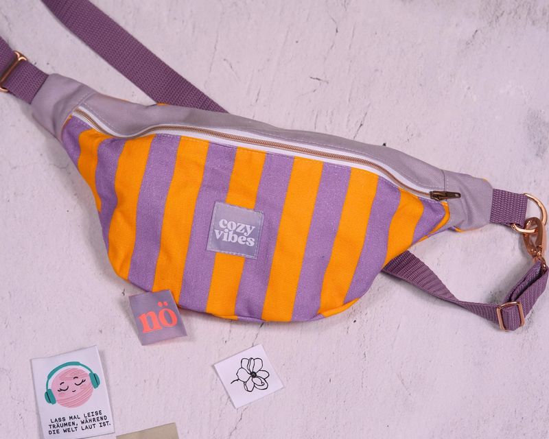 Bauchtasche Orang - Lila gestreift mit Label