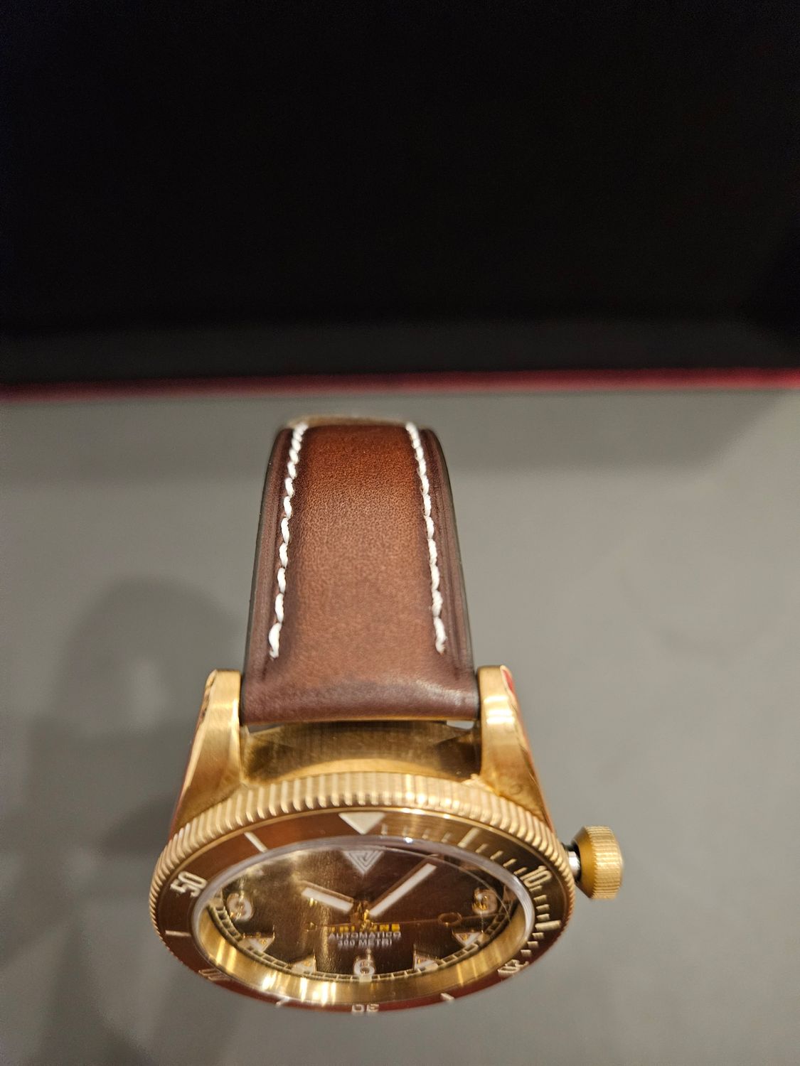 VERTIGO TRITONE BRONZO ROCCIA ROSSA