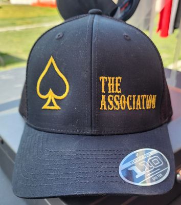 Hat w/Road Name -The Assoc Black Snapback