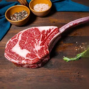 TOMAHAWK STEAK 19.59 a lb