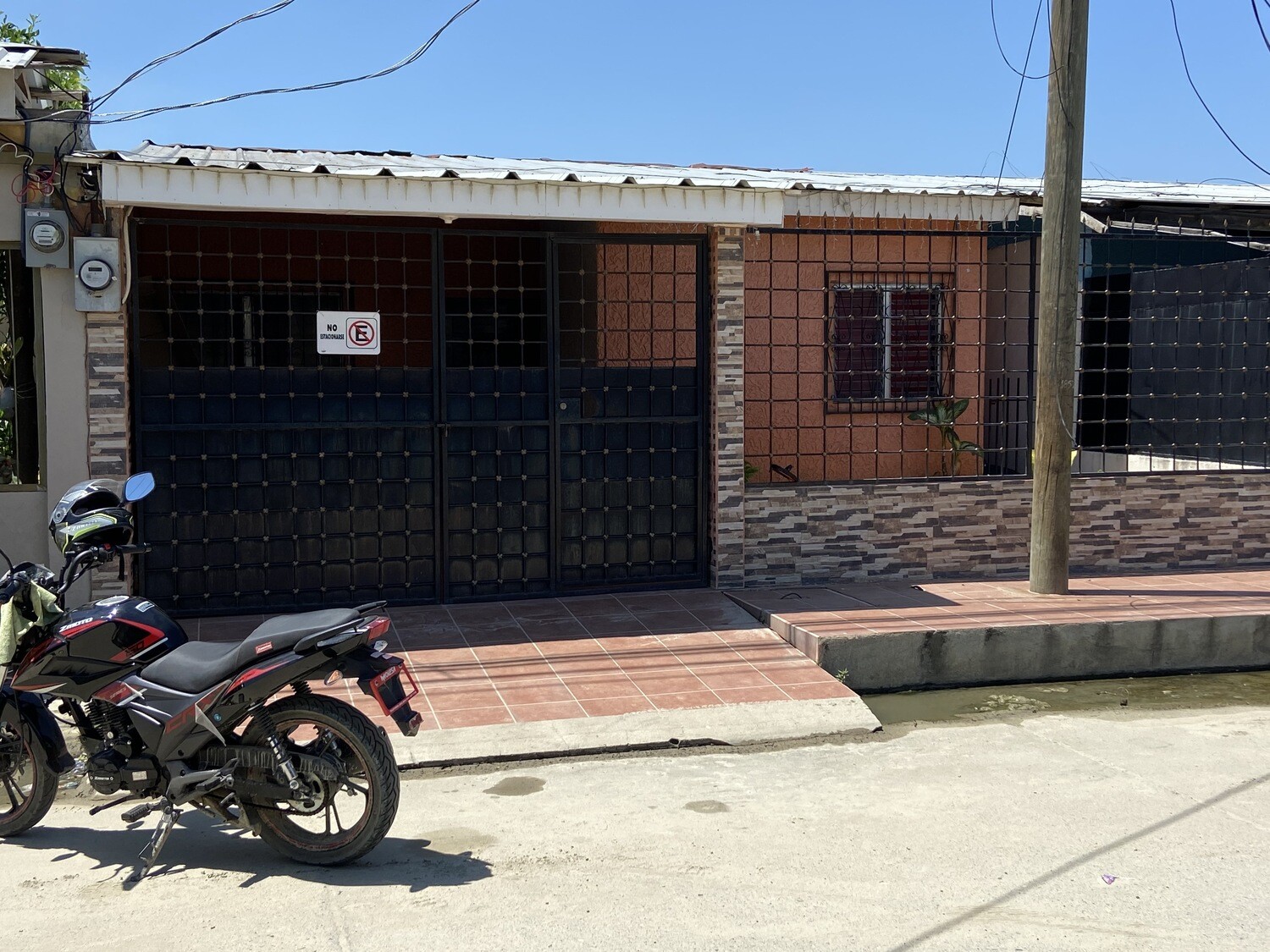 LOTE 955: INMUEBLE  UBICADO EN LA RESIDENCIAL LOMAS DE SAN JUAN LOTE # 5, BLOQUE # 26, SAN PEDRO SULA, CORTES