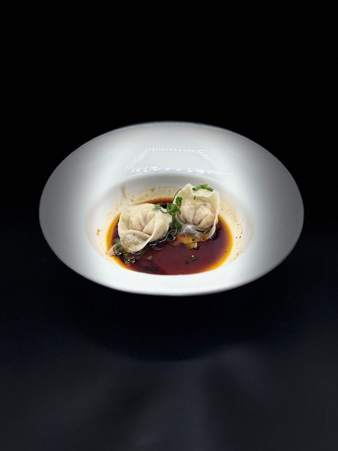 Ravioli di gamberi in salsa speciale mozi