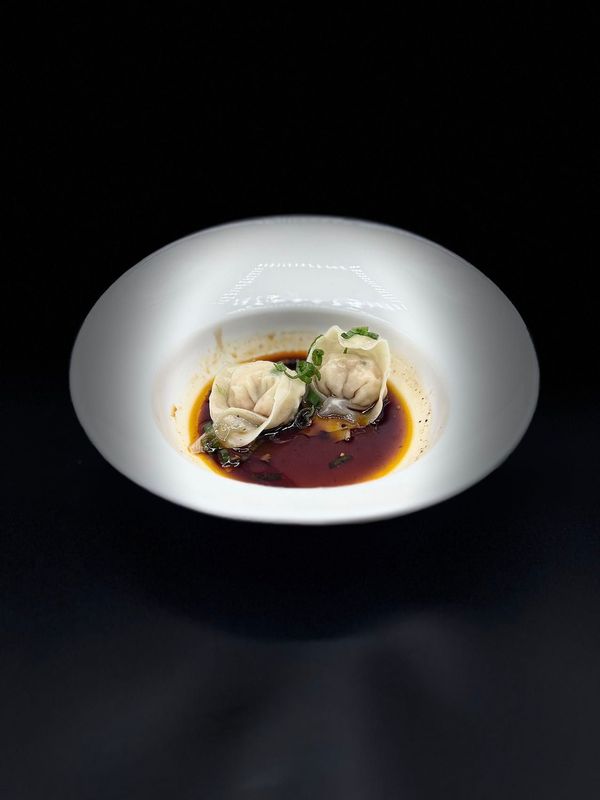 Ravioli di gamberi in salsa speciale mozi