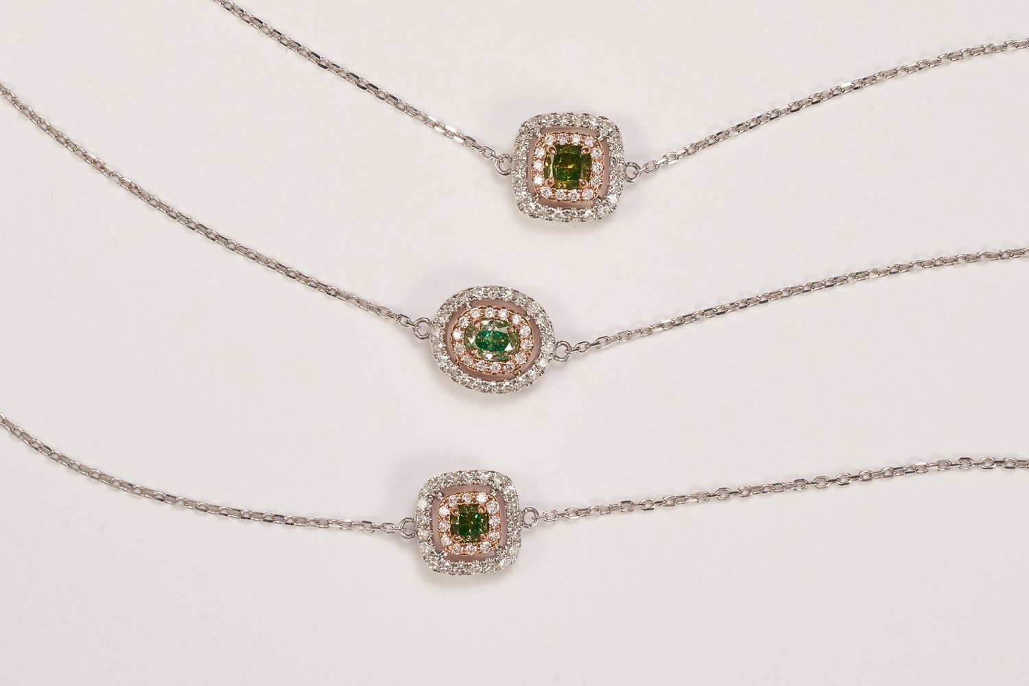 Green diamond halo bracelet