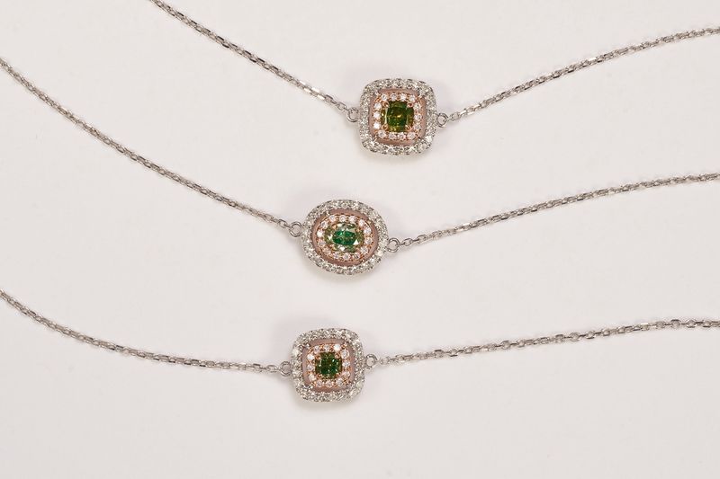 Green diamond halo bracelet