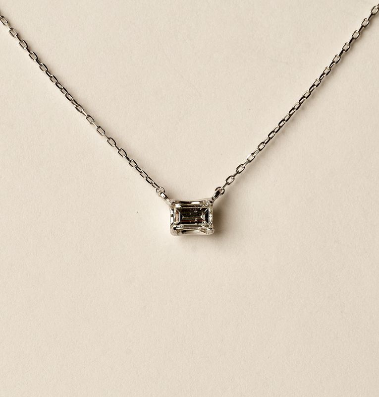 Emerald cut diamond necklace