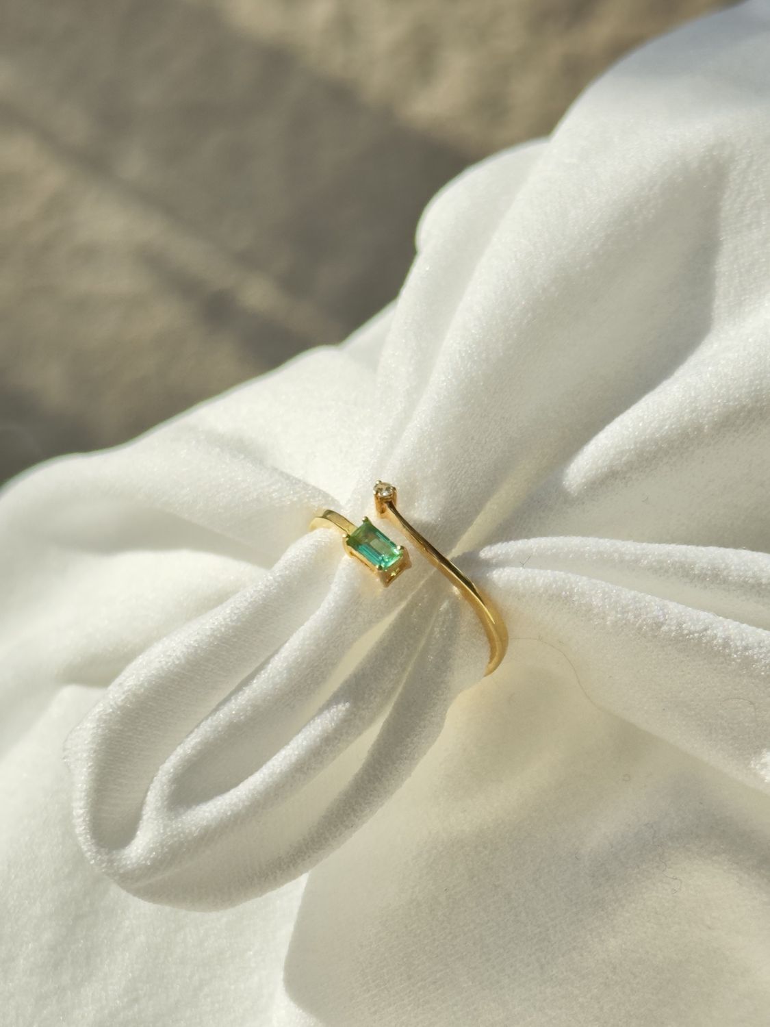 Emerald wrap around ring