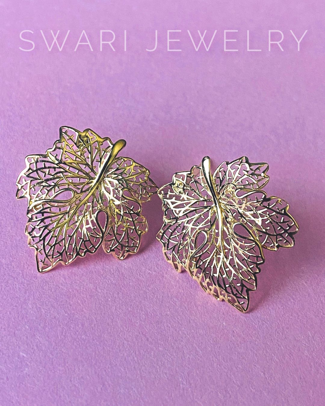 Leaf earrings 18KY -: .17cts/ G: 1.61g