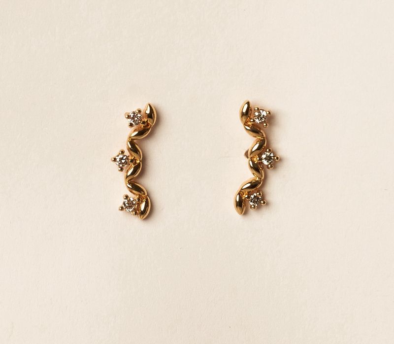 18KY Dia curve studs-.072ct/0.65g