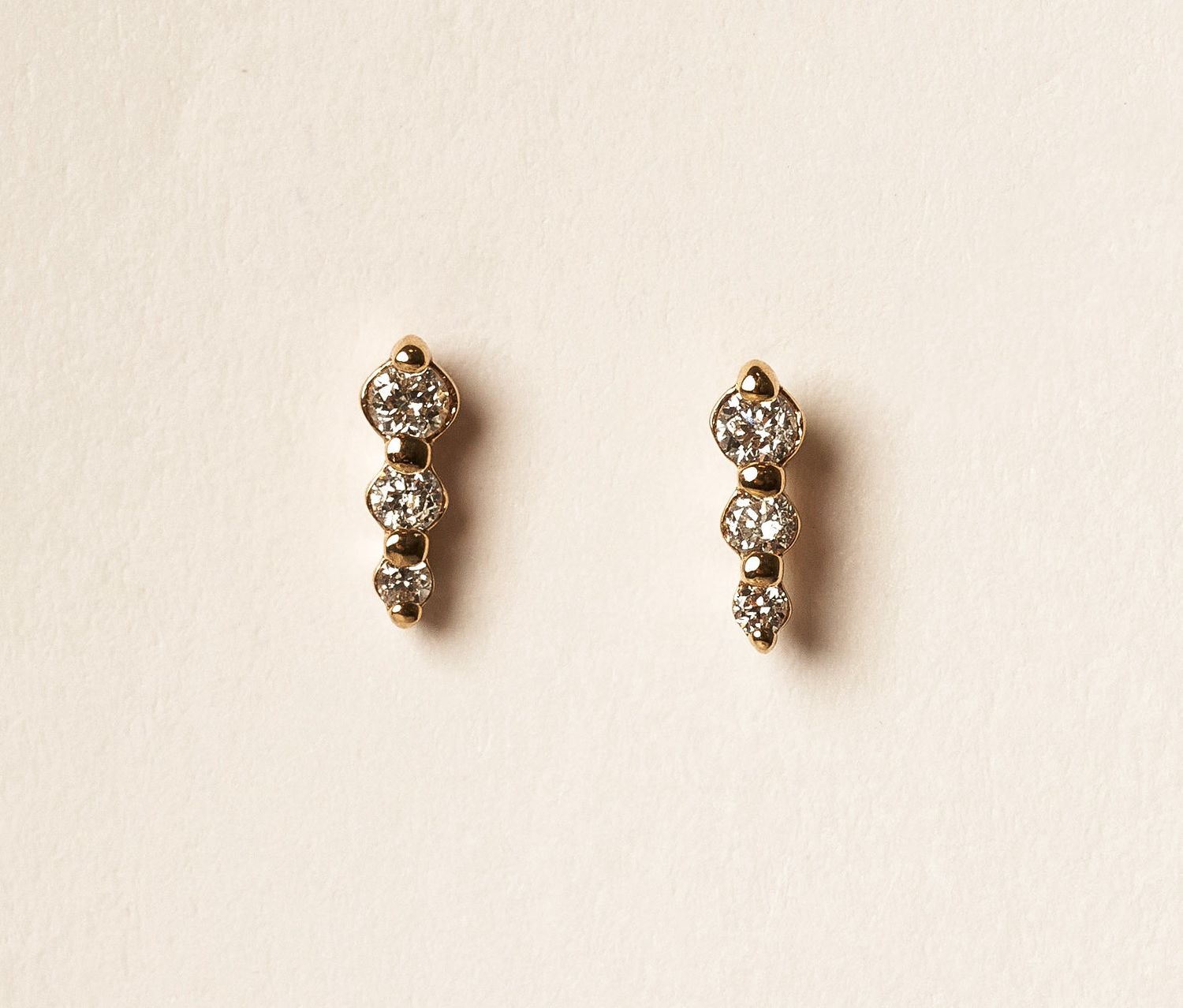 Mini dia studs 14KY D:.06 .44g