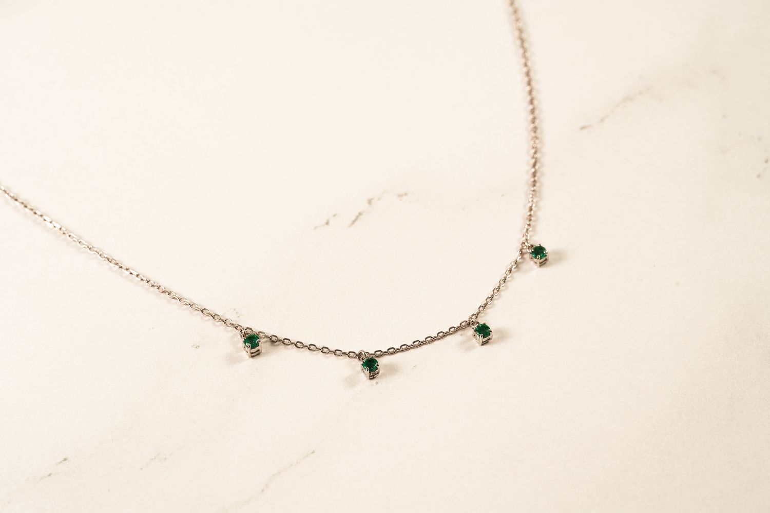 18KWG Mini Emerald .18cts/1.78g